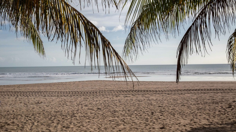 A beach temporarily closed due to the coronavirus in Kuta, Bali, Indonesia, on June 22, 2020. MUST CREDIT: Bloomberg photo by Putu Sayoga.