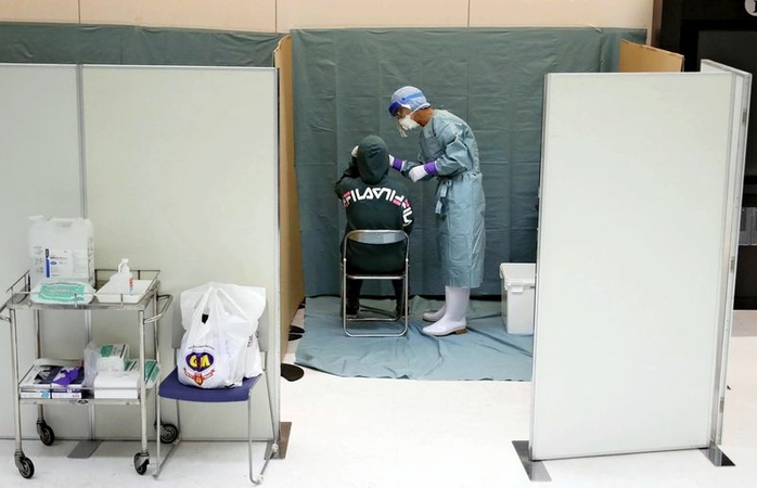 Japan plans to expand airport PCR testing capacity to 10,000 per day Japan plans to expand airport PCR testing capacity to 10,000 per day