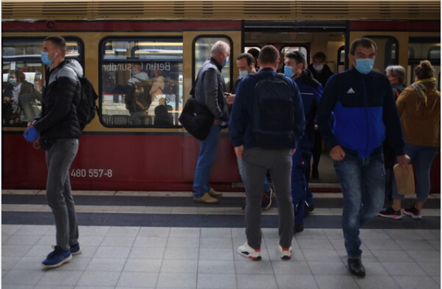 Commuters alight from an S-Bahn train at Gesundbrunnen station in Berlin, Germany, on May 4, 2020. MUST CREDIT: Bloomberg photo by Krisztian Bocsi.