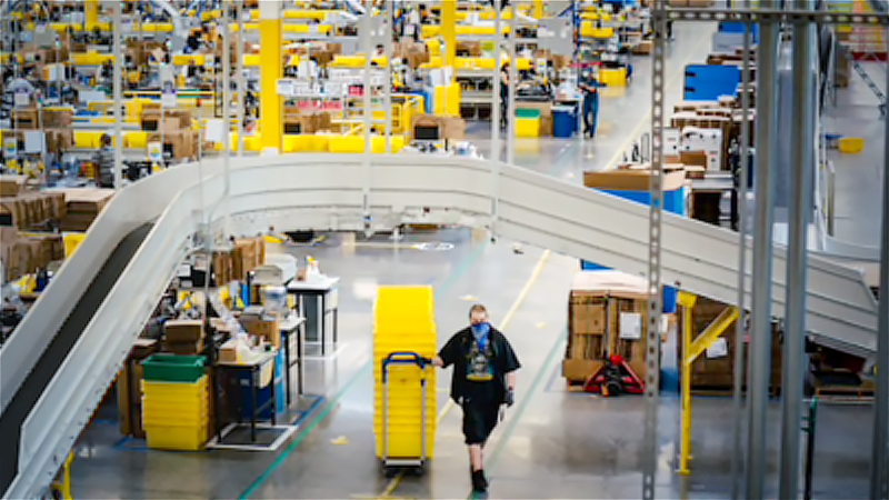 The Kent fulfillment center in May. Amazon has seen a slip in market share amid the pandemic. MUST CREDIT: photo for The Washington Post by Jovelle Tamayo.