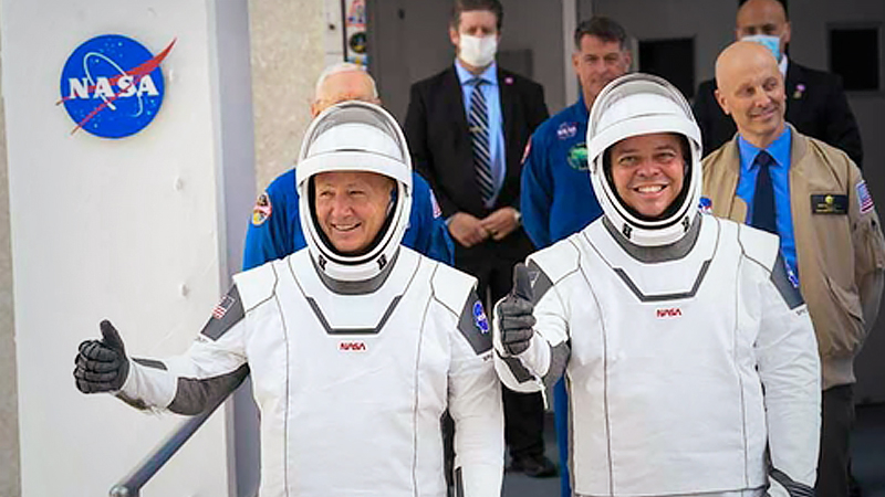 NASA commercial crew astronauts Doug Hurley, left, and Bob Behnken leave for their flight aboard the SpaceX Falcon 9 rocket on May 27, 2020. MUST CREDIT: Washington Post photo by Jonathan Newton