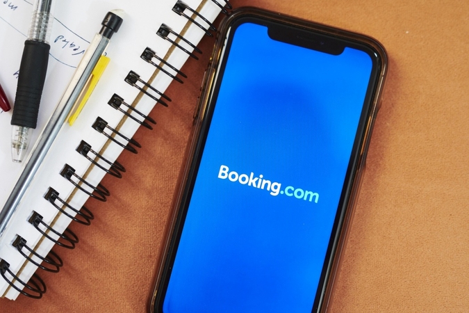 The logo for Booking.com is displayed on a smartphone on May 10, 2020. MUST CREDIT: Bloomberg photo by Gabby Jones.
Location: New York, United States