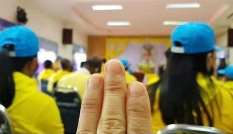Royalists urged to stop intimidating woman who made three-finger salute Royalists urged to stop intimidating woman who made three-finger salute