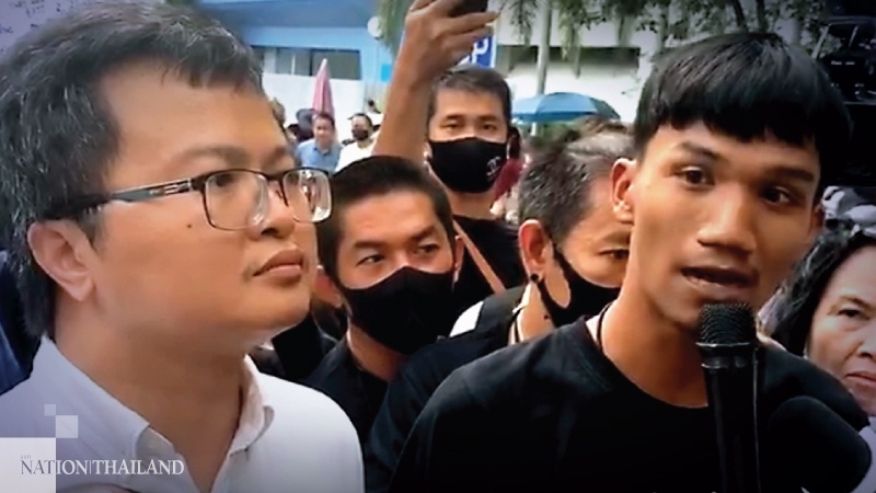 Anon Nampa, left, a prominent human rights lawyer, and Phanuphong Chatnok, a member of the Eastern Youth for Democracy