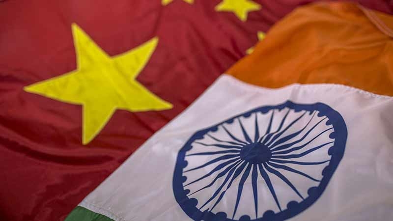 The national flags of China and India in Mumbai. Photographer: Dhiraj Singh/Bloomberg.