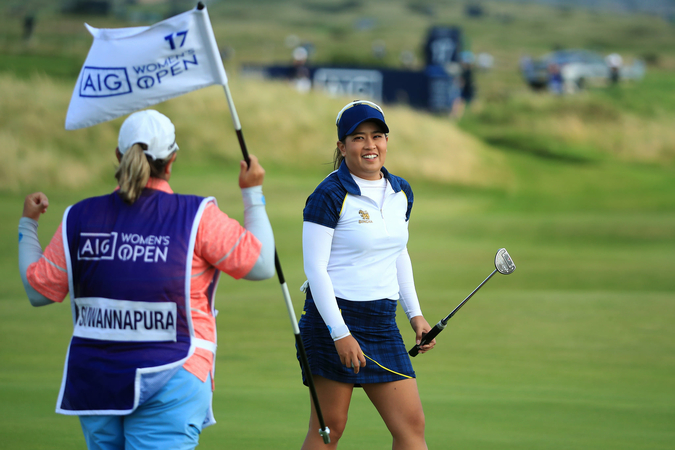 Jasmine Suwannapura smiles at her caddie during play. (Credit to LPGA)