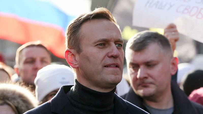 Russian opposition leader Alexei Navalny walks with demonstrators during a rally in Moscow on Feb. 29, 2019. MUST CREDIT: Bloomberg photo by Andrey Rudakov