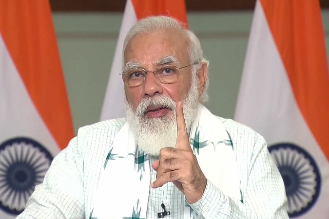 Prime Minister Narendra Modi addresses Atmanirbhar Bharat Defence Industry Outreach Webinar through video conference. (Photo: Twitter/@BJP4India)