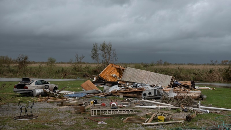 Storm clouds gather over a home that was destroyed after Hurricane Laura made landfall along the Texas-Louisiana border in Cameron Parish, La. MUST CREDIT: Photo by Callaghan O'Hare for The Washington Post)