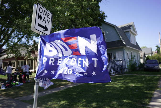A Biden flag decorates a pole in Kenosha, Wis., on Sept. 3. CREDIT: Photo for The Washington Post by Carlos Javier Ortiz