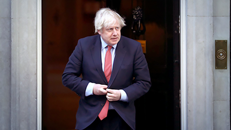 Competing pressures build on U.K.'s Johnson as covid surges Competing pressures build on U.K.'s Johnson as covid surges