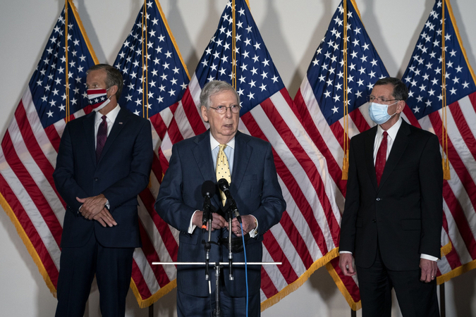 Senate Majority Leader Mitch McConnell, center, speaks during a news conference on Capitol Hill in Washington, D.C., on Sept. 9, 2020. MUST CREDIT: Bloomberg photo by Stefani Reynolds.