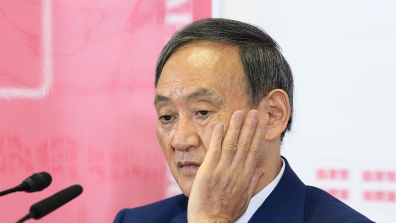 Yoshihide Suga, Japan's chief cabinet secretary, listens during a news conference in Tokyo on Sept. 8, 2020. MUST CREDIT: Bloomberg photo by Akio Kon.