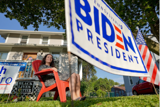 Nin Bell, 47, sits outside her home in Brookhaven, Pa. She regrets voting for Donald Trump in 2016. CREDIT: Washington Post photo by Bonnie Jo Mount