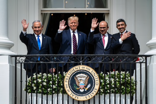 Israeli Prime Minister Benjamin Netanyahu, President Donald Trump, Bahrain Foreign Minister Khalid bin Ahmed Al Khalifa and United Arab Emirates Foreign Minister Abdullah bin Zayed Al-Nahyan, stand together during a signing ceremony at the White House on Tuesday. CREDIT: Washington Post photo by Jabin Botsford