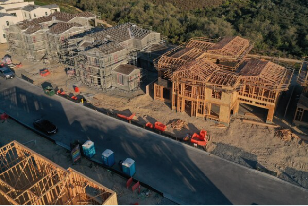 New homes under construction by Pardee Construction are seen in this aerial photograph taken over the Pacific Highlands Ranch master planned community in San Diego, California on Aug. 31, 2020. MUST CREDIT: Bloomberg photo by Bing Guan.