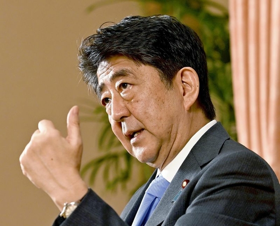 Former Prime Minister Shinzo Abe speaks during an interview at the Prime Minister’s Office in Tokyo on Tuesday. 