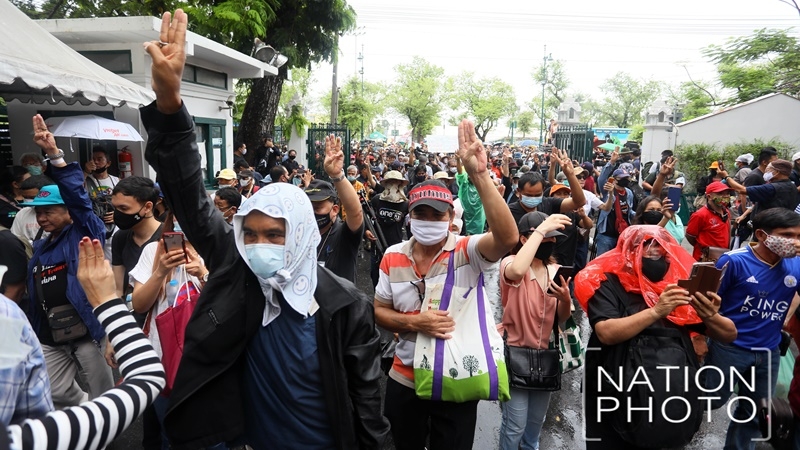 Protesters defy Thammasat ban and surge into football field for mega pro-democracy rally Protesters defy Thammasat ban and surge into football field for mega pro-democracy rally