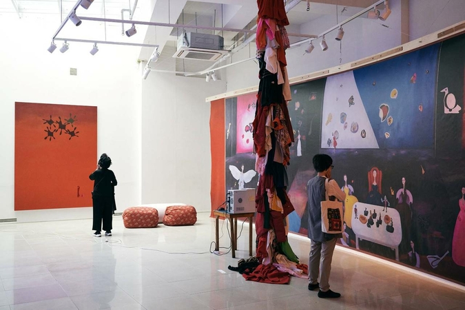 Participants look at the works on display at the Zaha Museum in Seoul during 2019 Korea Art Week.