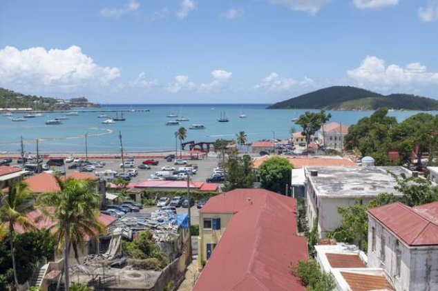 Boats sit in a bay in St. Thomas, U.S. Virgin Islands, in July 2019. MUST CREDIT: Bloomberg photo by Marco Bello
