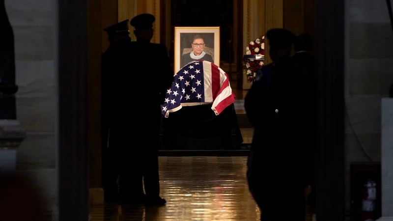 On Friday, Justice Ruth Bader Ginsburg became the first woman to lie in state at the U.S. Capitol. A week after her death, the honor marks the third day of services in Washington for Ginsburg, the second woman to serve on the high court and one who, in her 80s, became a cultural icon. MUST CREDIT: Washington Post photo by Jabin Botsford