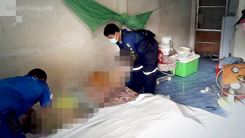 Young migrant worker dies with baby at her breast Young migrant worker dies with baby at her breast