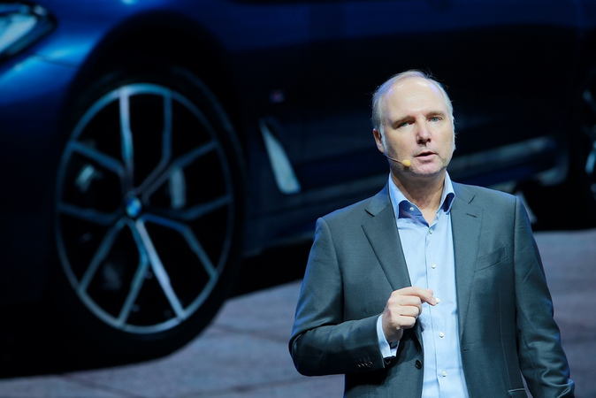 BMW Group China President and CEO Jochen Goller explains the carmaker's strategy at the Beijing auto show. [Photo provided to chinadaily.com.cn]