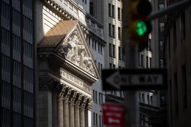 A streetlight stands in front of the New York Stock Exchange in New York on July 20, 2020. MUST CREDIT: Bloomberg photo by Michael Nagle.
