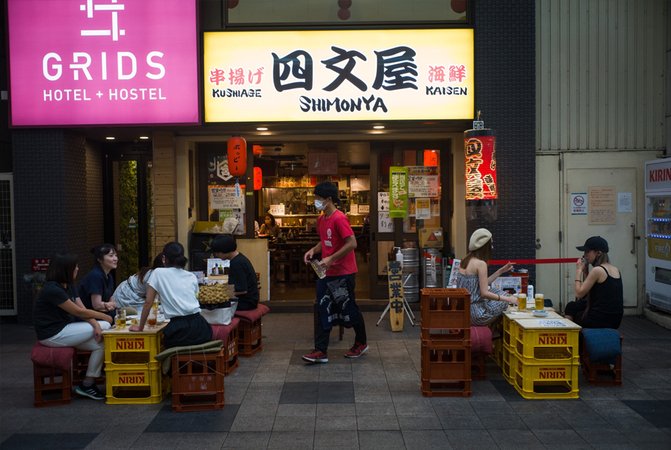 Cans of Kirin Ichiban beer on the production line in a Toride facotry. , Bloomberg