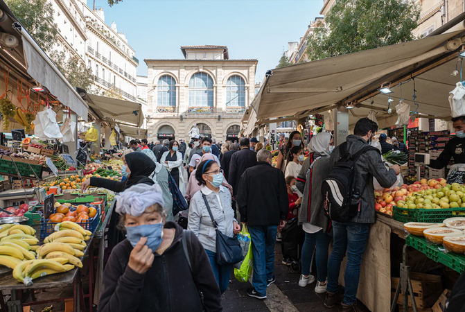 A market in Marseille, France. Bars and restaurants in the port city have been forced to close for two weeks to limit the spread of covid-19.