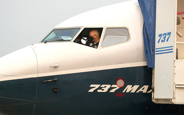 FAA Administrator Steve Dickson, sitting inside the flight deck of a Boeing 737 MAX aircraft, conducts a preflight check ahead of an evaluation flight rom
Boeing Field in Seattle, on Sept. 30, 2020. (Mike Siegel/ Pool via REUTERS.)