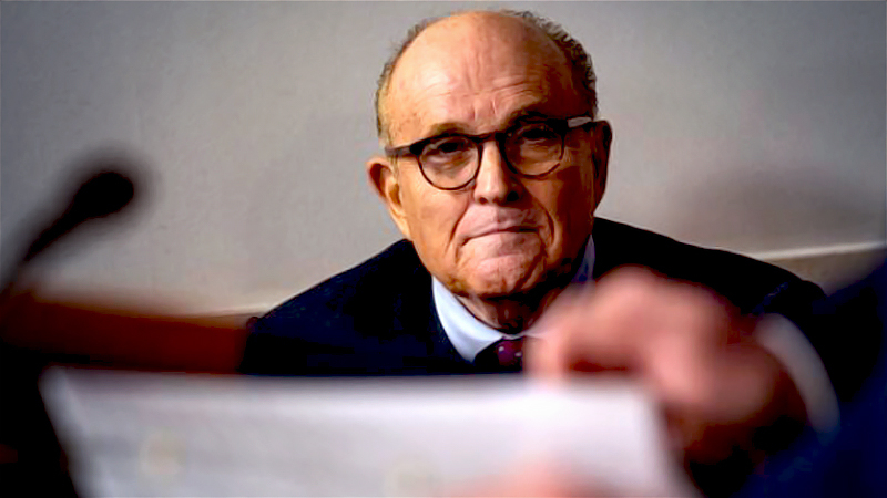 Rudy Giuliani listens as President Donald Trump speaks during a White House news briefing Sept. 27, 2020. MUST CREDIT: Washington Post photo by Salwan Georges
