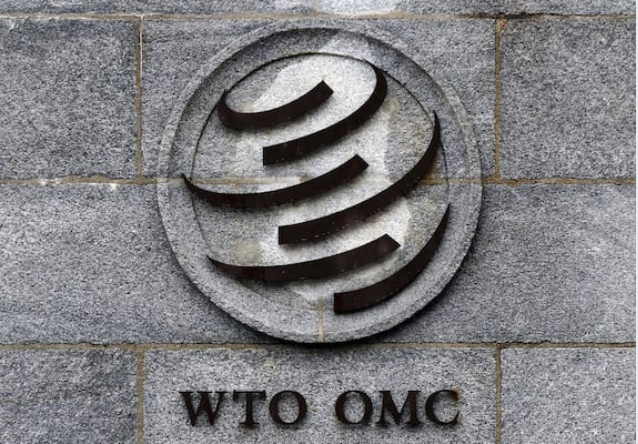 A logo stands on the wall outside the World Trade Organisation (WTO) headquarters in Geneva, Switzerland, on March 2, 2020. MUST CREDIT: Bloomberg photo by Stefan Wermuth.