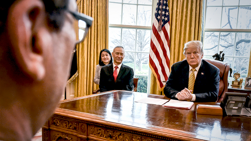 President Donald Trump talks with Treasury Secretary Steven Mnuchin, foreground left, during his meeting with Chinese Vice Premier Liu He, center, in the Oval Office on April 4, 2019. MUST CREDIT: Washington Post photo by Bill O'Leary
