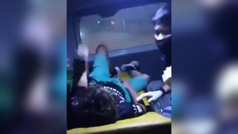 Clip of rescue worker consoling accident victim with love song goes viral Clip of rescue worker consoling accident victim with love song goes viral