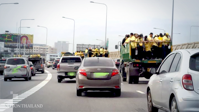 Drivers of trucks carrying yellow-clad royalists face action for violating tollway law Drivers of trucks carrying yellow-clad royalists face action for violating tollway law