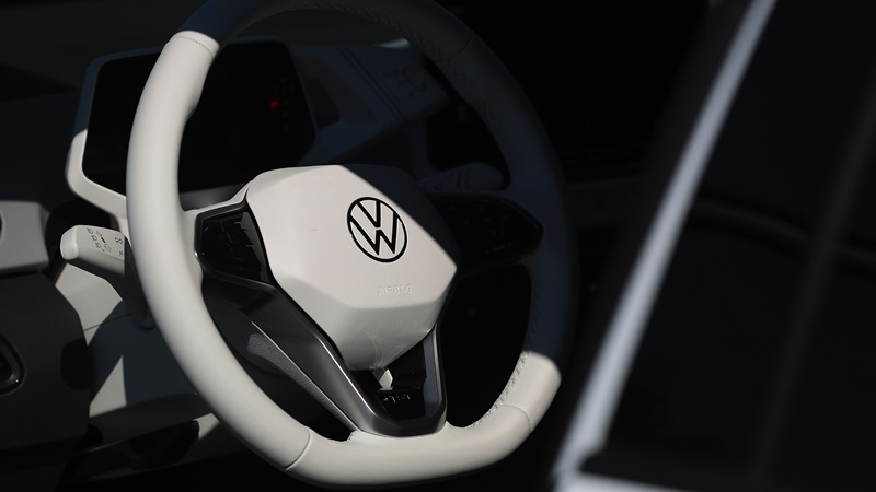A Volkswagen on the steering wheel of a VW ID.3 electric automobile, the first of around 22 million vehicles to be produced and delivered worldwide by 2028, at the automaker's factory in Dresden, Germany, on Sept. 11, 2020. MUST CREDIT: Bloomberg photo by Krisztian Bocsi.