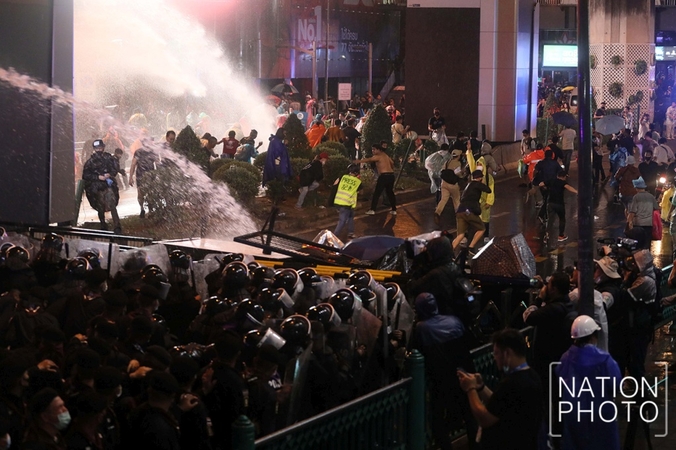 Police use water cannon to clear rally site Police use water cannon to clear rally site