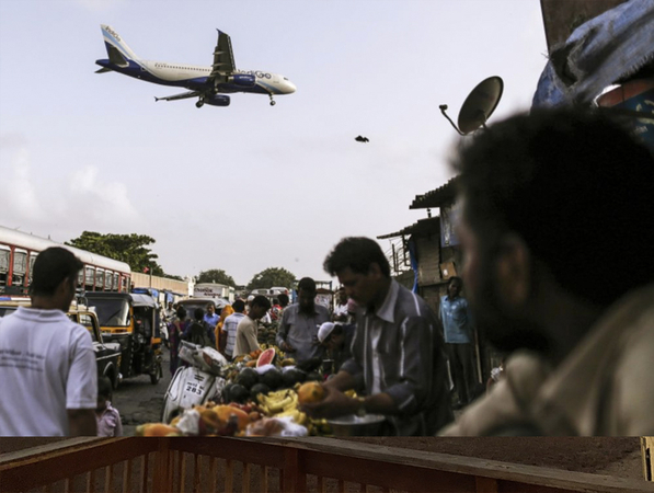 International travelers can now use options including flights under a government repatriation program. Photographer: Dhiraj Singh/Bloomberg