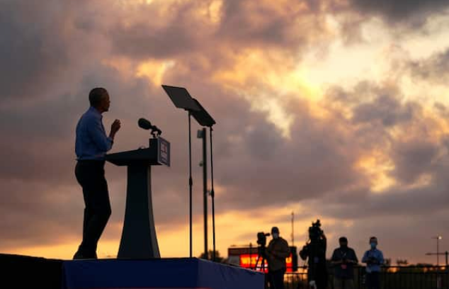 Former President Barack Obama speaks in support of Joe Biden during a drive-in rally in Philadelphia on Wednesday. MUST CREDIT: Washington Post photo by Bonnie Jo Mount
