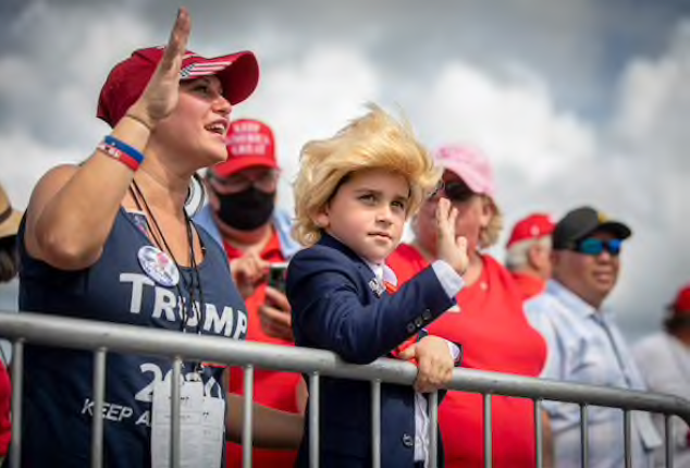 Gino Benford, 7, from Johnstown, Pa., attends a Trump rally in the Villages, Fla. Both campaigns are planning to make their final pitches in Florida and other swing states in the coming days. MUST CREDIT: Photo by Evelyn Hockstein for The Washington Post