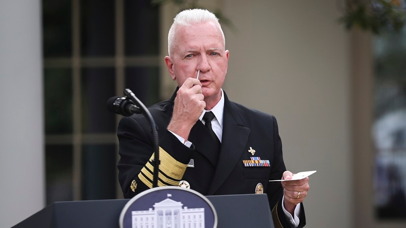 Adm. Brett Giroir, assistant secretary of Health and Human Services, swabs his nose to demonstrate a rapid-result covid-19 test at the White House Rose Garden on Sept. 28, 2020 in Washington, D.C. MUST CREDIT: Photo for The Washington Post by Oliver Contreras