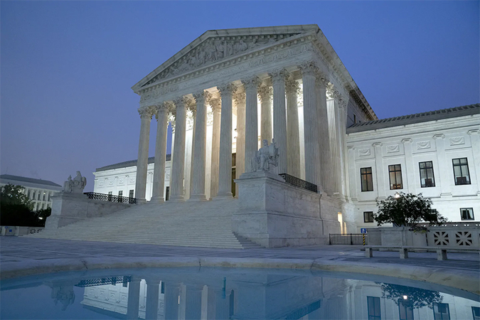 Lights illuminate the Supreme Court building in Washington last week. (Stefani Reynolds/ Bloomberg News)