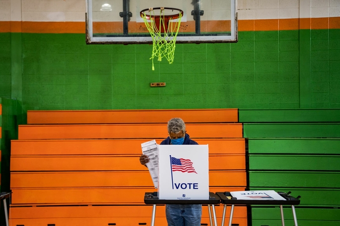 Guns at voting sites emerge as flash point in Michigan amid nationwide election tension Guns at voting sites emerge as flash point in Michigan amid nationwide election tension