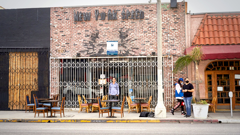 Barak Govani in front of his shuttered clothing store on Los Angeles' Melrose Avenue. MUST CREDIT: Bloomberg photo by Maggie Shannon