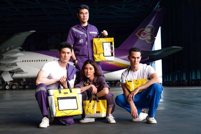 THAI transforms old life vests, slide rafts into fashionable handbags THAI transforms old life vests, slide rafts into fashionable handbags