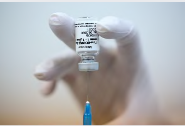 A heath worker draws the 'Gam-COVID-Vac', also known as 'Sputnik V', COVID-19 vaccine, developed by the Gamaleya National Research Center for Epidemiology and Microbiology and the Russian Direct Investment Fund (RDIF) at a clinic in Moscow on Sept. 23, 2020. MUST CREDIT: Bloomberg photo by Andrey Rudakov.