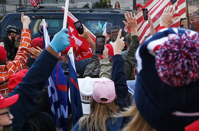 Thousands of mask-less Trump supporters rally in D.C., falsely claiming president won election Thousands of mask-less Trump supporters rally in D.C., falsely claiming president won election