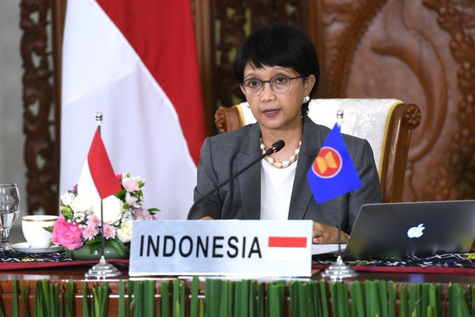Foreign Affairs Minister Retno LP Marsudi speaks on behalf of President Joko 