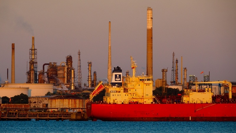 The tanker Navigator Genesis is moored near the Esso Fawley Oil Refinery in Fawley, England, on May 14, 2020. MUST CREDIT: Bloomberg photo by Luke MacGregor